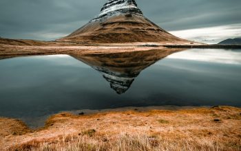 Wallpaper Cone Mountain with Distant Body of Water