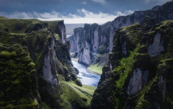 Wallpaper Aerial Photography of River Between Mountains During Daytime