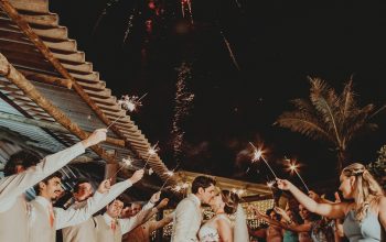 Wallpaper Man and Woman Wedding Couple Kissing Under Fireworks