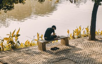 Wallpaper Man Sitting on Bench
