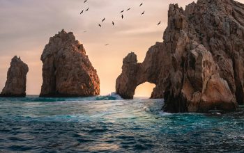 Wallpaper Rock Formation on the Ocean Photography