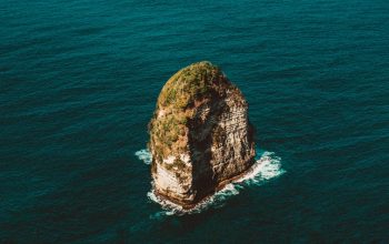 Wallpaper Gray Coastal Stack During Daytime