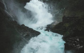 Wallpaper Waterfalls Under Grey Sky