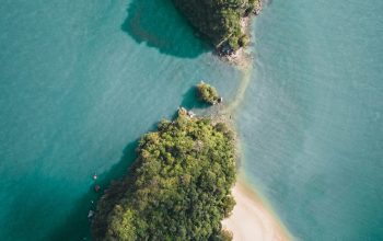 Wallpaper Aerial Photography of a Green Island