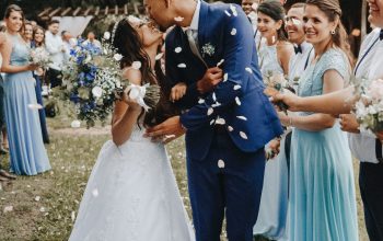 Wallpaper Man in Blue Suit Kissing Woman in White Wedding Dress
