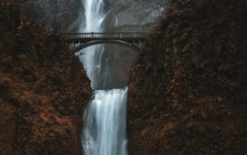 Wallpaper Waterfalls Under Bridge During Daytime