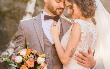 Wallpaper Woman in White Wedding Dress Holding Bouquet of Flowers