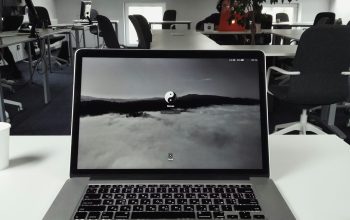 Wallpaper Macbook Pro on White Table