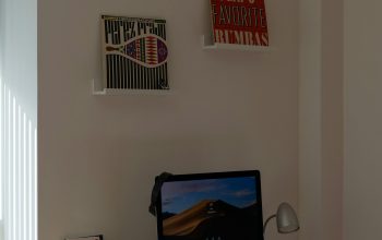 Wallpaper Black Flat Screen TV on White Table