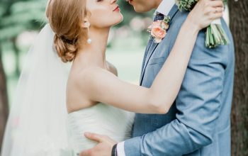 Wallpaper Man in Gray Suit Kissing Woman in White Dress