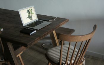 Wallpaper Black Laptop Computer on Brown Wooden Table