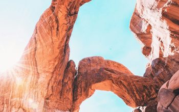 Wallpaper Brown Rock Formation Under Blue Sky