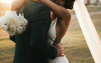 Wallpaper Man in Black Suit Kissing Woman in White Wedding Dress