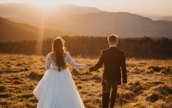 Wallpaper Man and Woman in Wedding Dress Walking on Brown Grass Field During Daytime