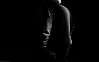 Wallpaper A Man Walking in the Dark Alone