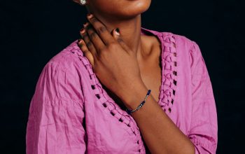 Wallpaper A Woman in a Pink Shirt