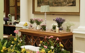 Wallpaper A Room with Flowers and a Table