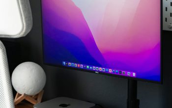 Wallpaper A Computer Monitor and Keyboard
