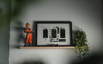 Wallpaper A Toy Figurine on a Shelf
