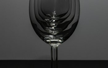 Wallpaper A Wine Glass on a Table