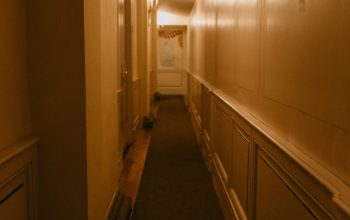 Wallpaper A Long Hallway with a Light