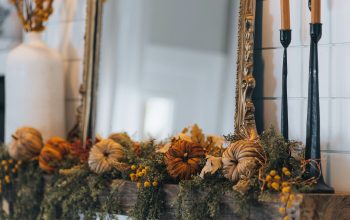 Wallpaper A Mirror and Some Candles on a Mantle