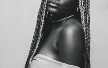 Wallpaper A Woman with Long Braids and a Dress