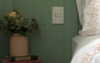 Wallpaper A Bed with a White Comforter and Pillows