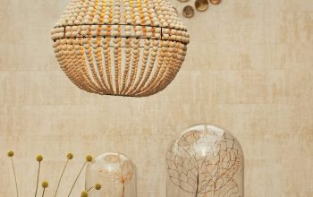 Wallpaper A Wooden Table Topped with Vases Filled with Flowers