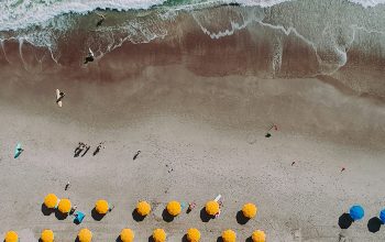 Wallpaper Aerial Photography of Umbrellas on Beach