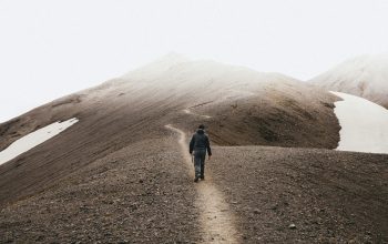 Wallpaper Man Walking on Mountain