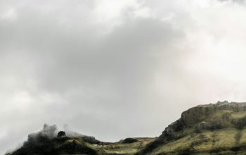 Wallpaper Mountain Under Cloudy Sky During Daytime