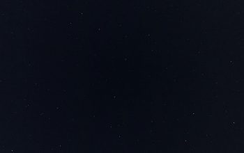 Wallpaper A Night Sky with a Few Stars