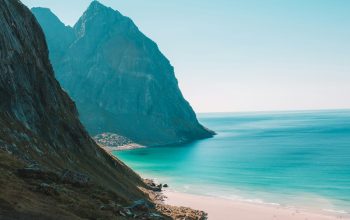 Wallpaper Landscape Photograph of Beach Near Mountain