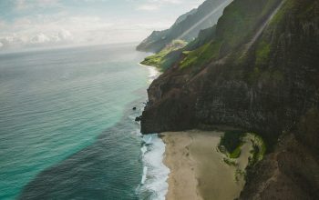Wallpaper Aerial Photography of Sea Under Cloudy Sky During Daytime