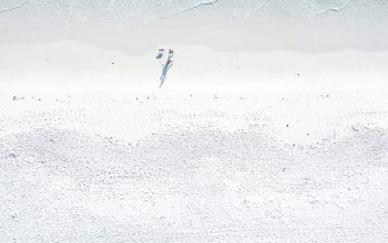 Wallpaper Two People on Beach During Daytime