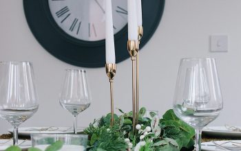 Wallpaper Three White Candles in Stainless Steel Candlesticks