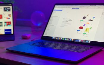 Wallpaper Turned-On Laptop on Desk