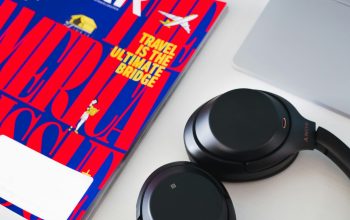 Wallpaper Black and Gray Bluetooth Headphones on White Table