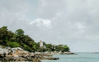 Wallpaper White and Orange Lighthouse in Rocky Beach