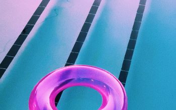 Wallpaper Pink Inflatable Ring on Pool