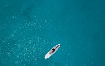 Wallpaper Person Riding White Surfboard