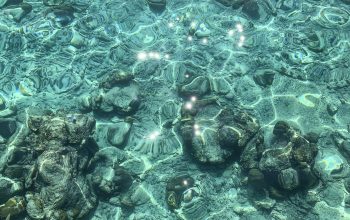 Wallpaper Rocks in Body of Water