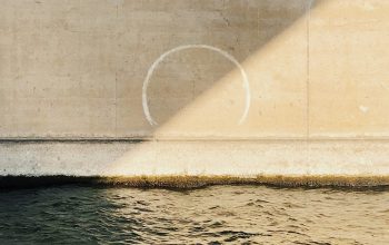 Wallpaper Body of Water Near Gray Concrete Wall