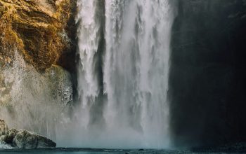 Wallpaper Waterfalls on Rocky Mountain During Daytime