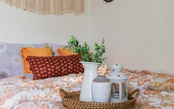 Wallpaper White Ceramic Mug on White and Brown Floral Tablecloth
