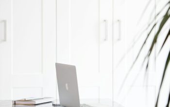 Wallpaper Silver Macbook on White Table