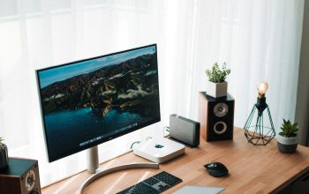Wallpaper Silver iMac on Brown Wooden Desk