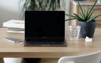 Wallpaper Macbook Pro on Brown Wooden Table