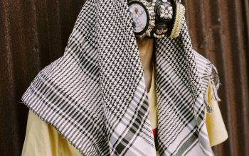 Wallpaper Man in Blue, White, and Brown Plaid Button-Up Shirt Wearing Brown Leather Face Mask